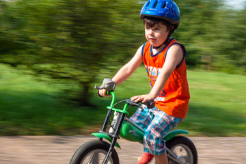 little boy on a bike