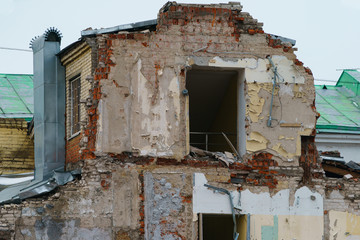 Photography of destroyed house in the Moscow. Demolition of dilapidated housing. Renovation...