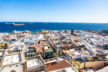 Naklejka na ściany i meble original head of the Spanish city, the capital of Gran Canaria, Las Palmas, from a lookout point to colorful houses