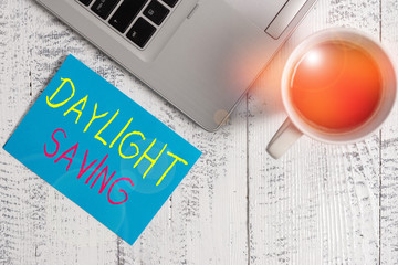 Conceptual hand writing showing Daylight Saving. Concept meaning turning the clock ahead as warmer...