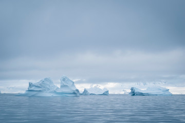 Antarctic glacier in the snow. Beautiful winter background.