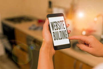 Conceptual hand writing showing Website Building. Concept meaning tools that typically allow the...