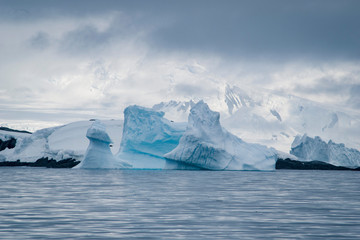 Antarctic glacier in the snow. Beautiful winter background.