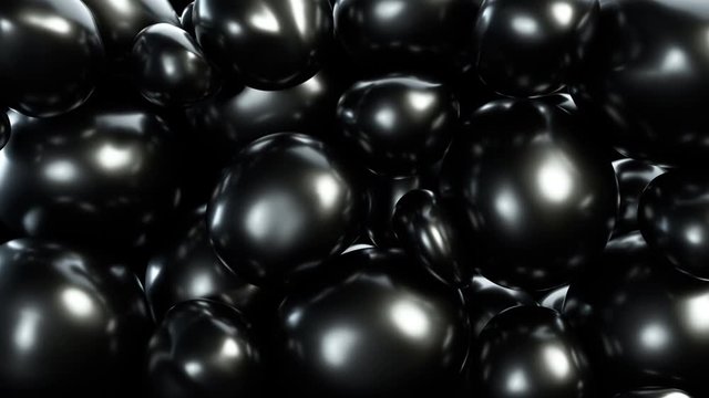 Abstract black squishy balls move and interact with each other with internal pressure trying to find a place for themselves