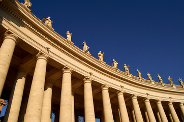 Architectural detail of the columns in the Vatican City square in Rome. Italy. Religious sculptures.