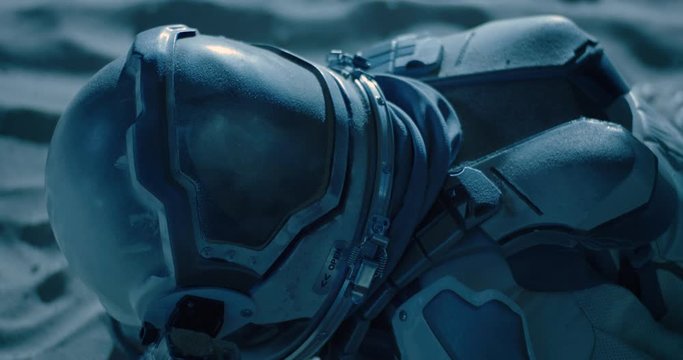 Remains of a dead astronaut lying on a planet