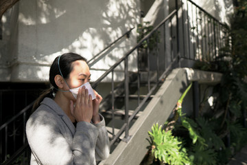 Fototapeta premium Putting on Mask