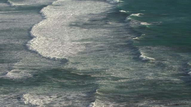 Top view of Ocean waves on golden hour