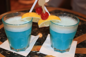Blue cocktail with fruits