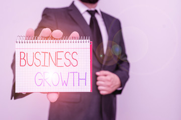 Conceptual hand writing showing Business Growth. Concept meaning process of improving some measure...