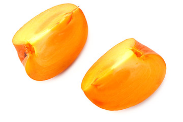 fresh ripe persimmons slices isolated on white background. top view