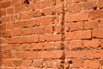 red brick wall of a historic ancient building