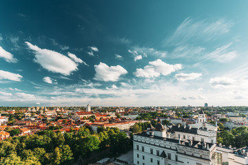 Vilnius, Lithuania. Old Town Historic Center Cityscape Under Dramatic Sky And Bright Sun In Sunny Summer Day. Travel Panorama. UNESCO. Famous And Popular Place