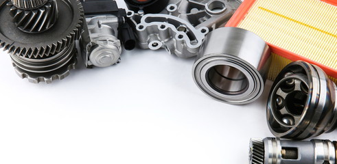new car parts on white background top view with copy space