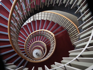 looking down a spiral staircase from above 