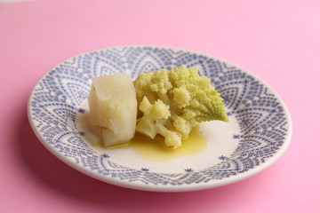 romanesco vegetable dish in color background