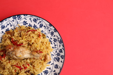plate of rice with chicken and peppers