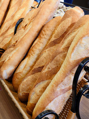 Many French breads on display at stores