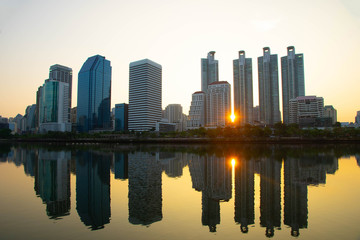 Cityscape benjakitti park in Bangkok Thailand with sunrise 