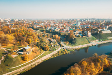 Fototapeta premium Grodno, Belarus. Aerial Bird's-eye View Of Hrodna Cityscape Skyline. Kalozha Church And Other Famous Popular Historic Landmarks In Sunny Autumn Day. Church of Sts. Boris and Gleb.