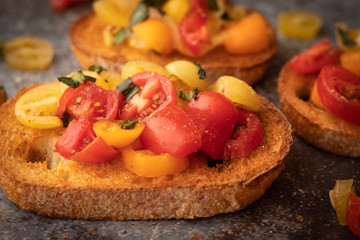 Bruschetta with Basil and Tomato on Toast Close Up