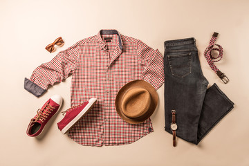 Men's casual fashion outfit - jeans, plaid shirt and red sneakers