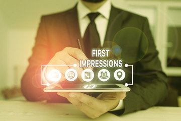 Conceptual hand writing showing First Impressions. Concept meaning first consideration or judgment...
