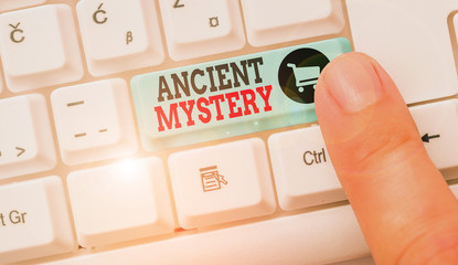 Conceptual hand writing showing Ancient Mystery. Concept meaning anything that is kept secret or...
