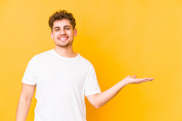  showing a copy space on a palm and holding another hand on waist.