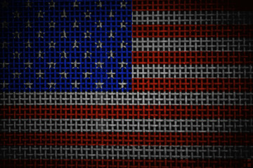 Close up on an old metal grid vintage American US national flag
