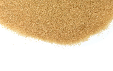 Closeup pile brown sugar isolated on white background. 