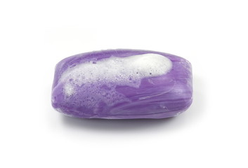 Soap bar with foam isolated on white background. Wet bar of soap.