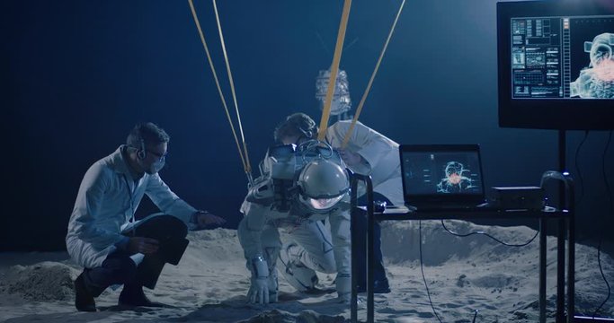 Astronaut and scientists testing for zero-gravity
