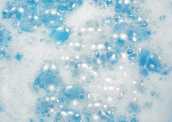 Foam bubble from soap or shampoo washing on top view. Foam background. White foam.