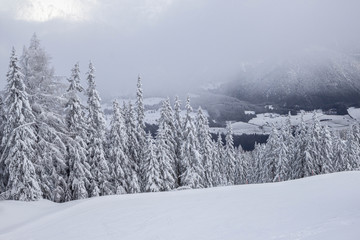 view of piste at ski resort in Austrian alps