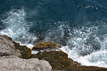 waves crashing on rocks