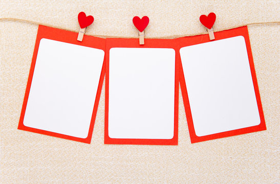 Valentine's day, postcard, restaurant menu, Three rags with red hearts on a clothesline, three red backgrounds for text and photos with white inserts of a piece of paper, natural linen background