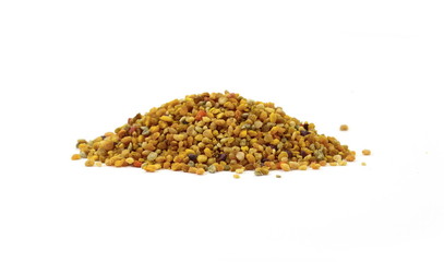 Pile of bee pollen isolated on white.