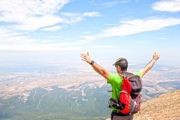 Man on the Moncayo mountain enjoying the view in summer
