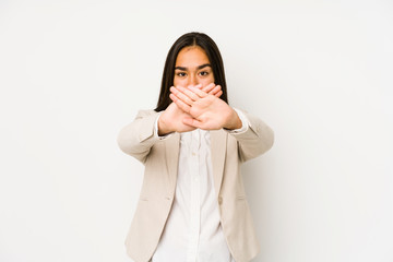 Young woman isolated on a white background doing a denial gesture