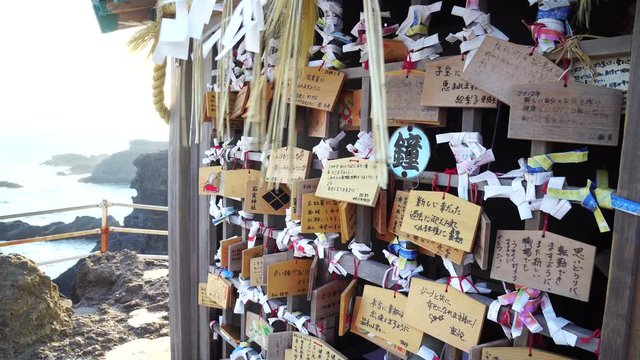 Ema prayer tables at a Japanese shrine. Ema are small wooden plaques used for wishes by Shinto believers.