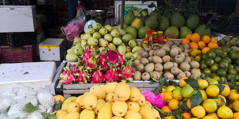 Exotic fresh fruits in a market. Vietnam.