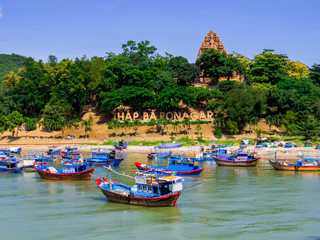 View of the Cai River with the Ponagar Tower in the background. In Nha Trang, Vietnam