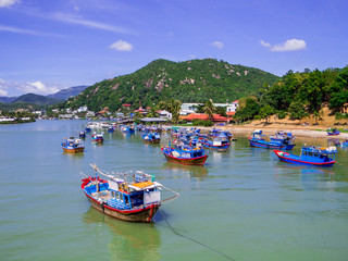 Fototapeta na wymiar Traditional boats on the Cai River in Nha Trang, Vietnam