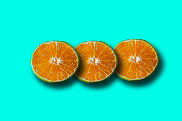 Oranges pattern creative flat layout on trendy color background. Fruits flat design.