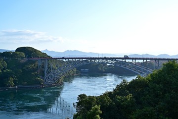 Obraz na płótnie Canvas 西海橋と針尾瀬戸の急流のコラボ情景＠西海、長崎