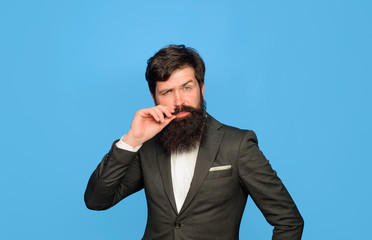 Handsome leader CEO boss portrait. Serious businessman in suit. Businessman in stylish clothes. Executive business man at workspace. Serious confident businessman. Business, people and office concept.