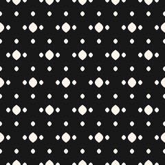 Vector polka dot seamless pattern. Simple minimalist black and white background with spots, dots, ovate shapes. Abstract minimal monochrome texture. Stylish dark design for decor, fabric, covers, web