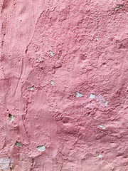 Pink stone rough old wall spray painted texture concrete background in retro style with copy space