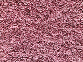 Pink stone grain wall spray painted texture concrete background in retro style with copy space